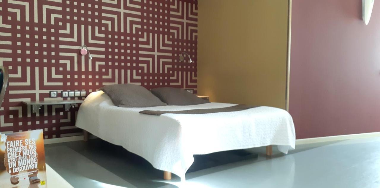Logis Hotel & Restaurant Arcombelle ม็องตินี-เลอ-รัว ภายนอก รูปภาพ